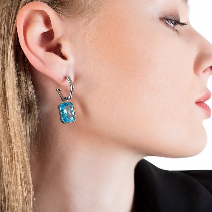 Σκουλαρίκια κρίκοι ατσάλινοι με γαλάζια πέτρα ζιργκόν