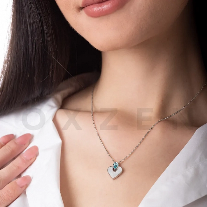 Κολιέ από ανοξείδωτο ατσάλι καρδιά με φίλντισι και γαλάζιο κρύσταλλο