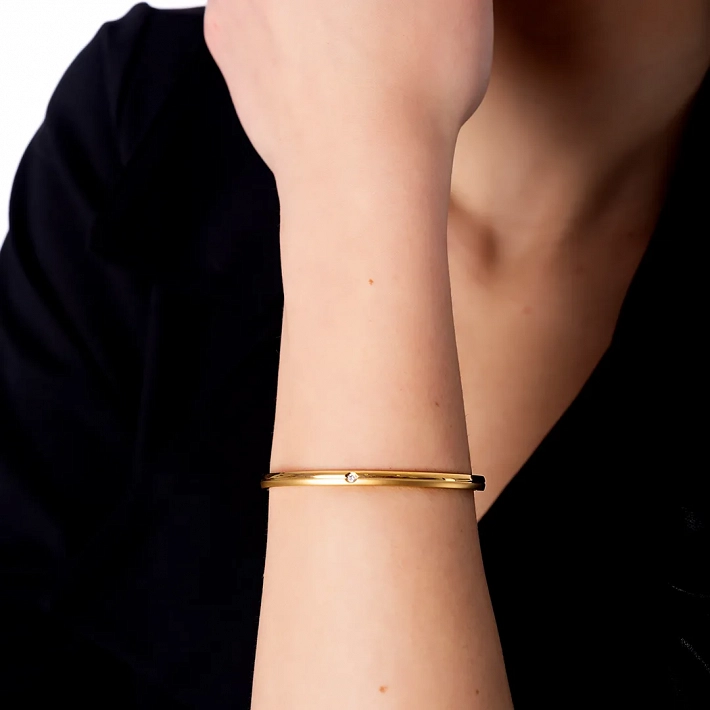 Βραχιόλι γυναικείο από ανοξείδωτο ατσάλι με λευκό ζιργκόν χειροπέδα με κούμπωμα