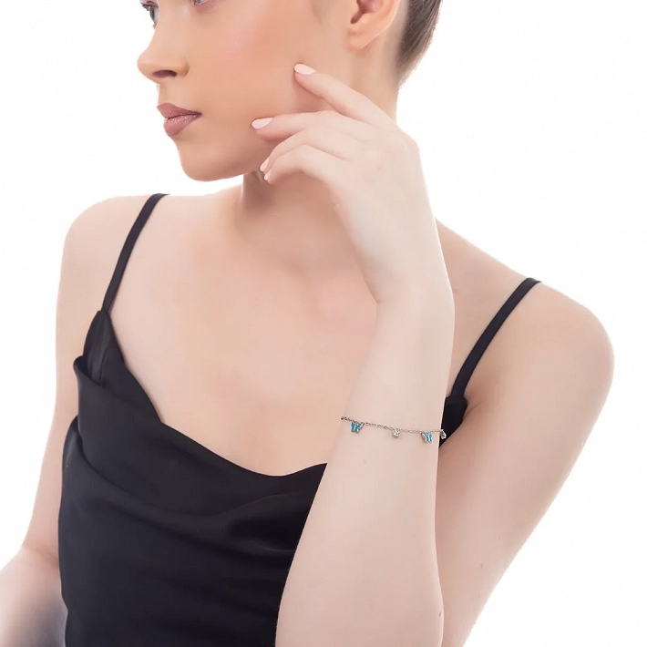 Oxzen γυναικείο βραχιόλι ατσάλινο με κρεμαστές γαλάζιες πεταλούδες