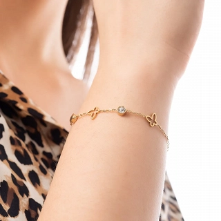 Βραχιόλι ατσάλινο με πεταλούδες και λευκά ζιργκόν