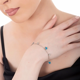 Oxzen γυναικείο βραχιόλι ατσάλινο με κρεμαστές γαλάζιες κορώνες